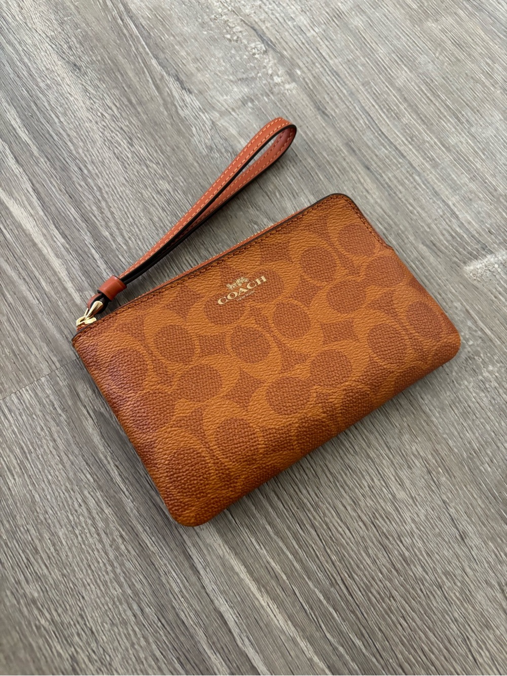 Coach Corner Zip Wristlet In Signature Canvas